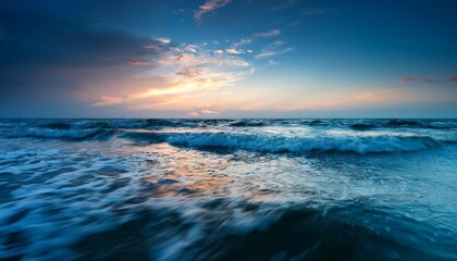 Calm ocean waves at twilight.