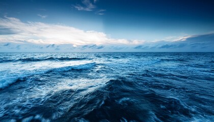 Fototapeta premium Calm ocean waves at twilight.