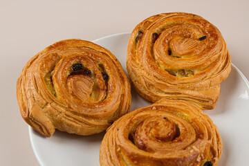 Plate with homemade baked goods on a light background