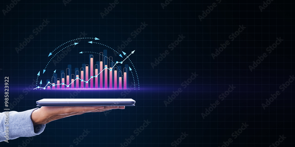 Poster hand holding a tablet with a glowing upward trend graph on a dark grid background, representing fina