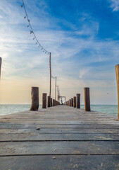 Naklejka premium wooden pier on the beach