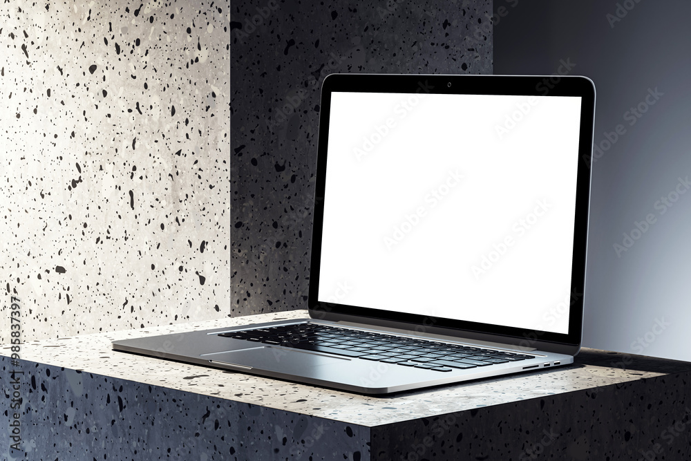 Poster modern laptop with blank screen on textured stone pedestal. 3d rendering