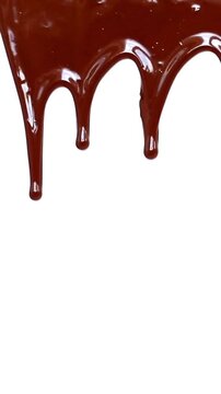 melted chocolate dripping on white background