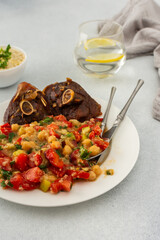 Delicious hearty lunch or dinner, chickpea stew with stewed vegetables, roasted turkey and hummus, healthy delicious food