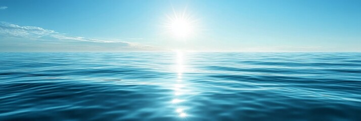 Tranquil ocean scene with a deep blue sky and sparkling water reflecting the summer sun. The image evokes serenity, peace, and a sense of endless blue horizon.
