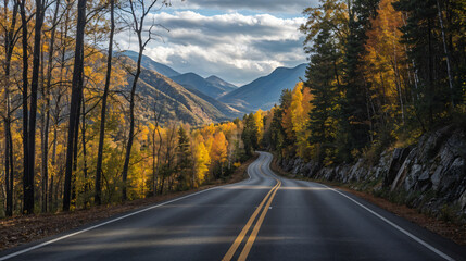 Travel road, brown forest view on the side, autumn and mountains in front, clear sky