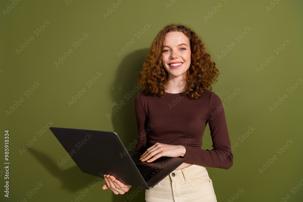 Canvas Prints Photo of adorable lovely girl wear brown shirt chatting instagram twitter telegram facebook isolated khaki color background