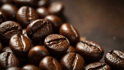 Close-up of rich roasted coffee beans with highlighted texture.