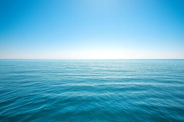 Obraz premium Tranquil Blue Ocean Under a Clear Sky