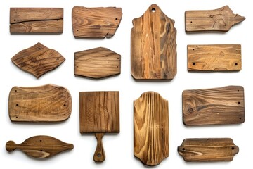 Naklejka premium A collection of wooden cutting boards on a white surface, suitable for various uses such as kitchen decor or cooking demonstration