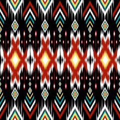 Traditional bright ikat pattern with geometric shapes. High resolution, perfect for textiles, wallpaper or fashion background, interior decoration.