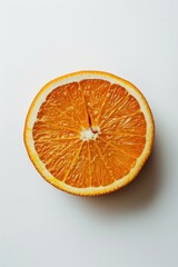 Fresh orange cut into two halves on a white background