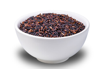 Closeup view of raw riceberry, rice berry seeds in white ceramic bowl isokated on white background with clipping path.