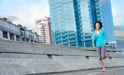 Fitness, bridge and woman running in morning in city for race, marathon or endurance training in road. Sports, health and athlete with cardio workout or exercise for outdoor challenge in urban town.