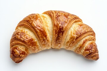 A top down image shows a croissant a tasty French pastry made with flour butter and yeast against a white backdrop