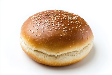 Aerial image of a hamburger bun on a white background featuring a golden hue and sesame seeds