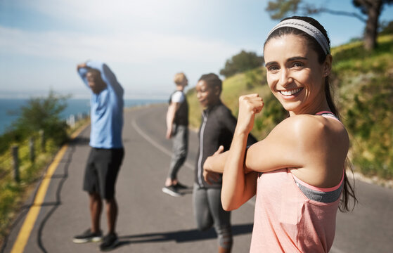 Fitness, portrait and warm up on road for stretching, training and running exercise preparation. Woman, friends and cardio on mountain asphalt for wellness, marathon and muscle endurance in nature