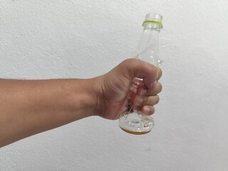 person holding a glass of water