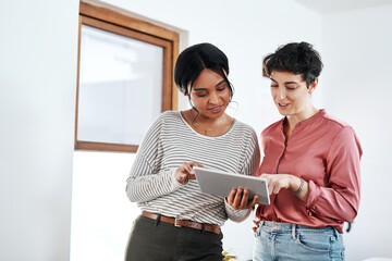 Designer, teamwork or women on tablet in startup for planning, project review or company feedback....