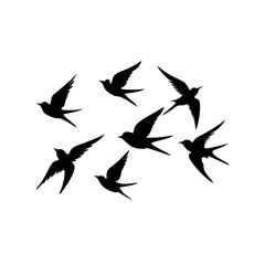 a group of nine birds flying in a random pattern. The birds are black and are silhouetted against a white background
