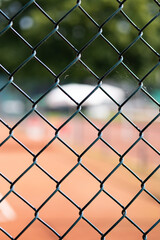 Fototapeta premium a green and high fence