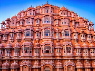 The stunning Hawa Mahal in Jaipur features an intricate pink facade and a unique architectural design, captivating visitors with its mesmerizing beauty and historical significance.