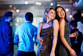 Excited, friends and dance with champagne at nightclub for birthday celebration, social reunion or luxury party. Smile, women and wine glass for new years, festival congratulations and happy hour fun