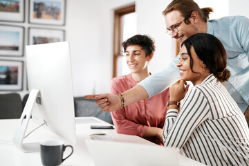 Business, people and smile with pointing on computer at office for deadline or task competition....