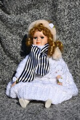 vinted porcelain doll - knitted winter clothes