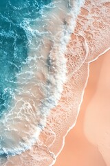 Aerial View of Ocean Waves Crashing on Sandy Beach