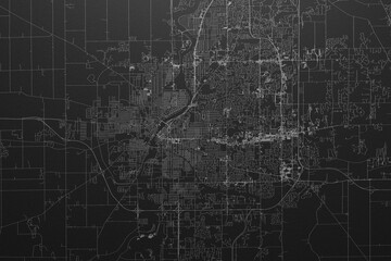 Street map of Rockford (Illinois, USA) on black paper with light coming from top