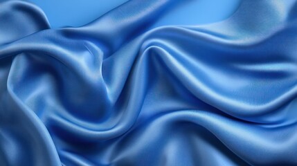 Obraz premium Close up of blue silk fabric with elegant waves and texture.