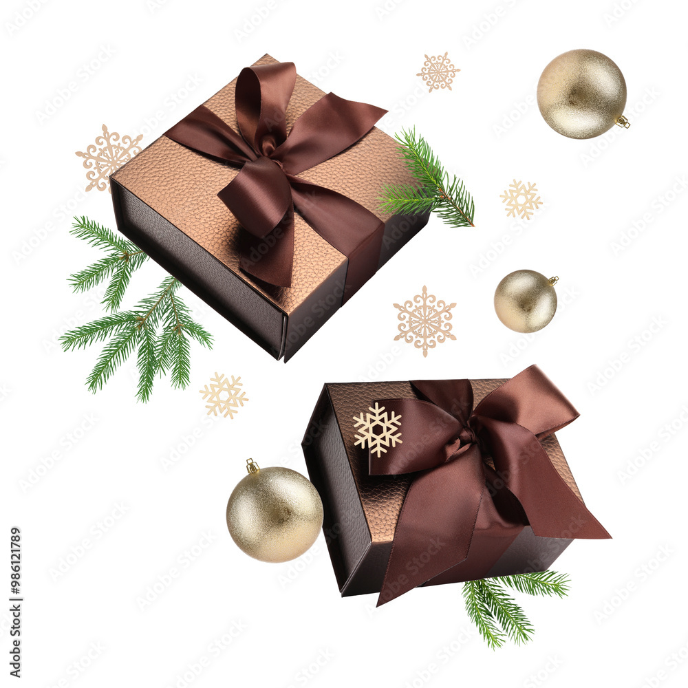 Sticker gift boxes, christmas balls, fir tree branches and decorative snowflakes in air on white background