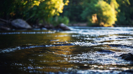 Fototapeta premium Blurred bokeh of a calm, flowing river