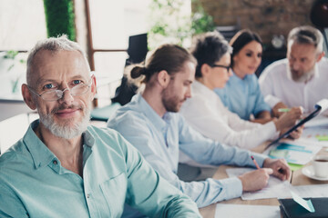 Fototapeta premium Photo of coworking project teamwork people senior man chief look camera work together conference meeting successful nice light office