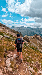 Fototapeta premium Mountaineering in the heights of the Pyrenees: Ascent to Pico Algas and Pico Argualas, surrounded by the majestic Arnales and Garmo Negro peaks in the impressive Tena Valley, Panticosa.