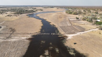 Thamalakane river during the dry winter months in Maun, Botswana, Africa