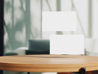 Clean minimal business card mockup on table with office background
