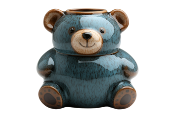 a blue bear shaped ceramic vase.