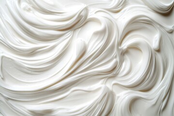 White cream swirls pattern texture background. Close-up. Abstract cosmetic wallpaper