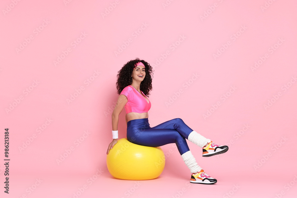 Poster Aerobics. Happy woman with fitness ball on pink background