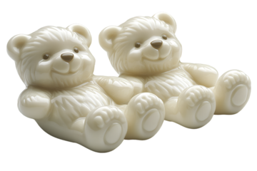 a couple of white teddy bears. 