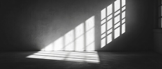 Obraz premium A window in a room is letting in sunlight, creating a shadow on the floor