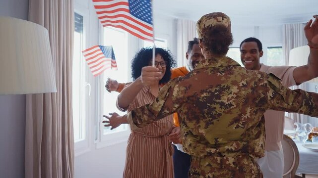 Cinematic video of a woman leaving for the military army service and greeting her father, mother and brother at home.