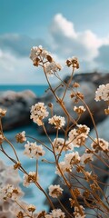 Close up of White Flowers with a Blue Ocean in the Background