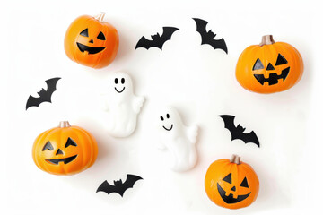 Cute ghosts, black bats and orange pumpkins on a white background. Halloween background.