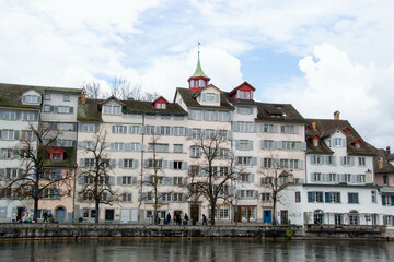 Scenic summer view of the Old Town architecture of Zurich with the bridge Untertorbryukke over Aare river, Zurich, Switzerland. High quality photo