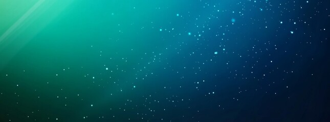 Abstract starry background with vibrant blue and green hues.
