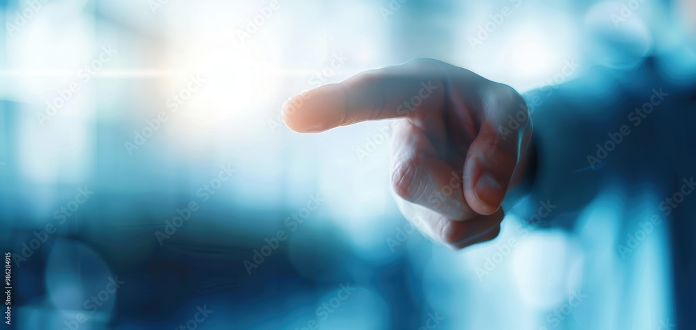 Poster a close-up of a finger reaching towards a glowing light, symbolizing connection, innovation, and tec
