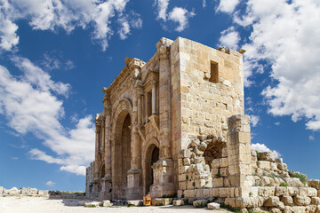 Arch of Hadrian in Gerasa (Jerash)-- was built to honor the visit of emperor Hadrian to Jerash in 129/130 AD, Jordan. Against the background of a beautiful sky with clouds